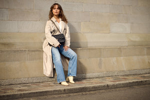 Stylish lady holding onto secondhandbags Chanel Bag